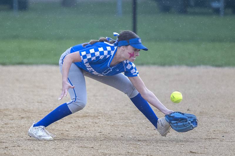 Newman’s Brenleigh Cook misplays a grounder at short against Dixon Thursday, April 11, 2024 at Reynolds Field in Dixon.