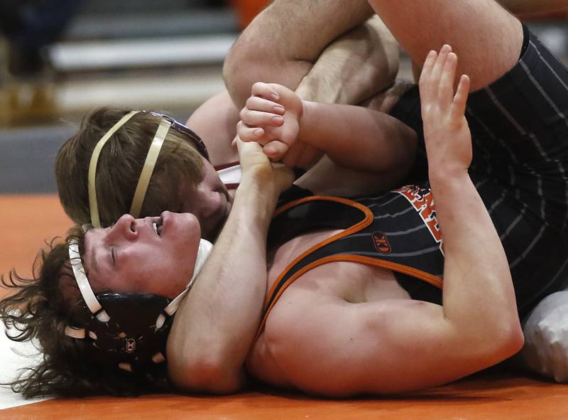 Morris’ Tyler Semlar pins Crystal Lake Central’s Brett Campagna during the 144-pound championship match of a the IHSA 2A Crystal Lake Central Wrestling Regional on Saturday, Feb. 3, 2024, at Crystal Lake Central High School.