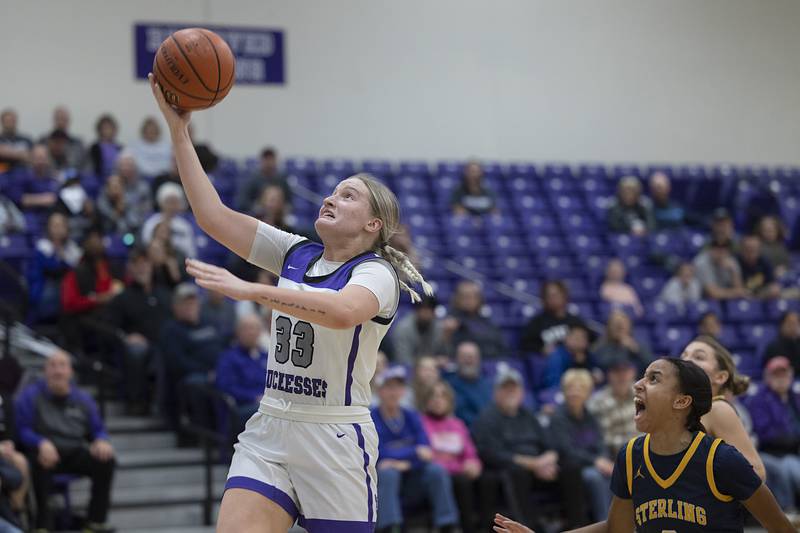 Dixon’s Jessie Pitman puts up a shot against Sterling Tuesday, Feb. 13, 2024 during a regional semifinal at Rochelle.