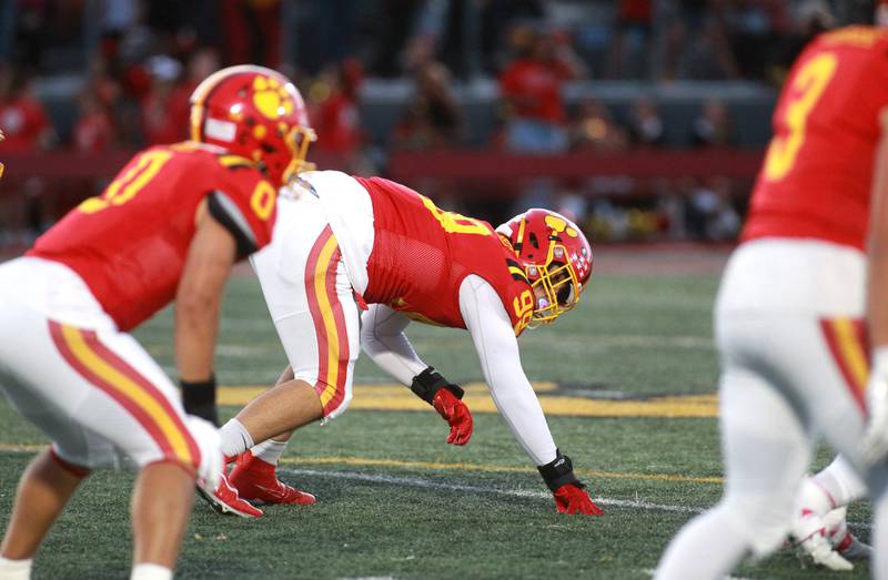 Batavia’s Xavier Blanquel (center) watches the snap during a game against South Elgin Friday, Sept. 6, 2024 in Batavia.