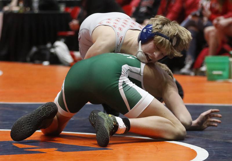 Woodstock Marian’s Brayden Teunissen controls Coal City’s Luke Munsterman during the 126-pound match the IHSA Class 1A Dual Team Sate Championship match Saturday, Feb. 24, 2024 at Grossinger Motors Arena in Bloomington.