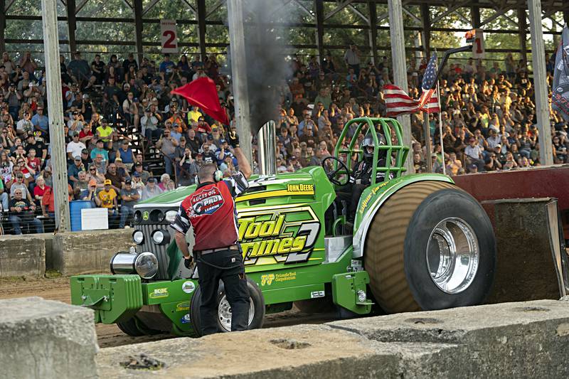 Randy Barreau shuts down his run at the Badger State Tractor Pullers event Wednesday, August 9, 2023 at the Carroll County fair.