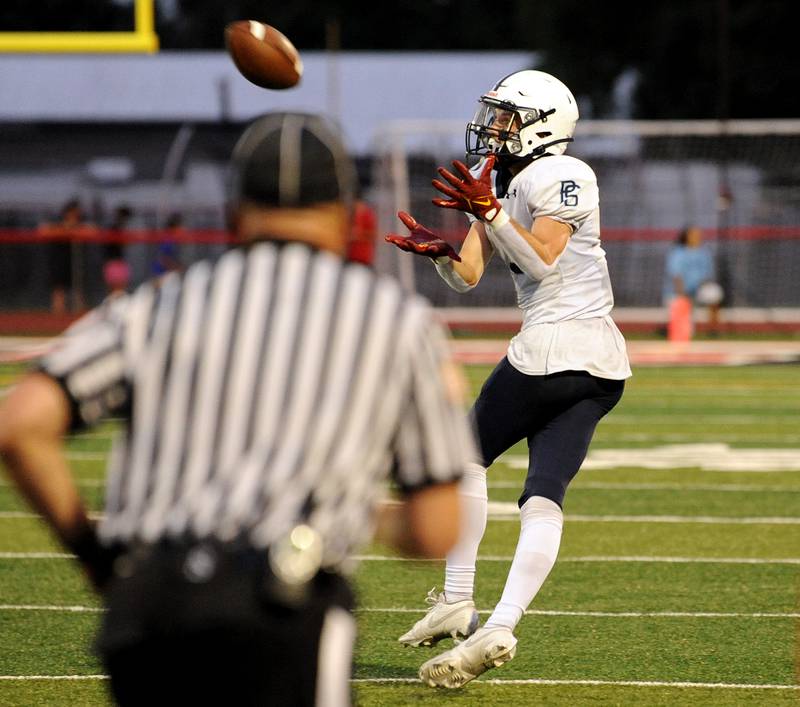 Plainfield South wide receiver Caden Pierceall (3) makes a catch all alone, against the Yorkville defense, for a long gain on Friday, Sep. 30, 2024, at Yorkville High School.