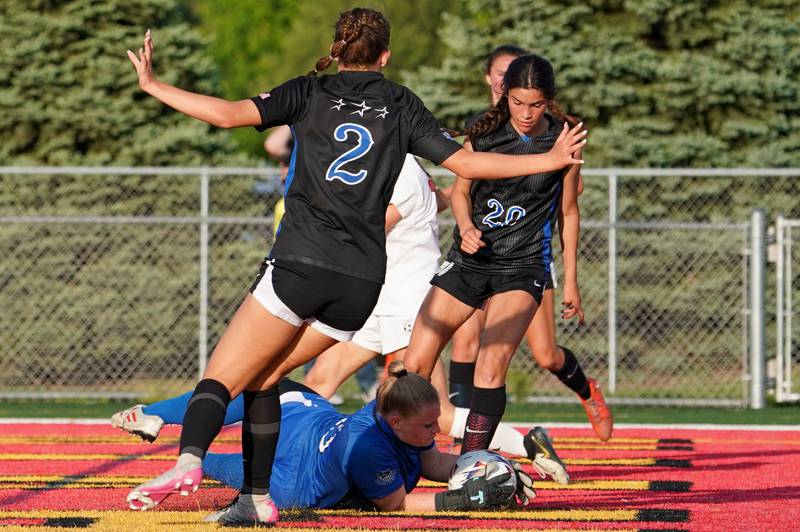 St. Charles North's Lauren Korioth (0) makes a diving save against Batavia during a Class 3A Batavia Regional final soccer match at Batavia High School in Batavia on Friday, May 17, 2024.