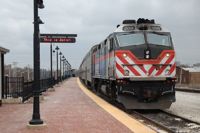 A Metra train waits to depart at the Joliet Gateway Center train station on Wednesday, Jan. 3, 2024, in Joliet.
