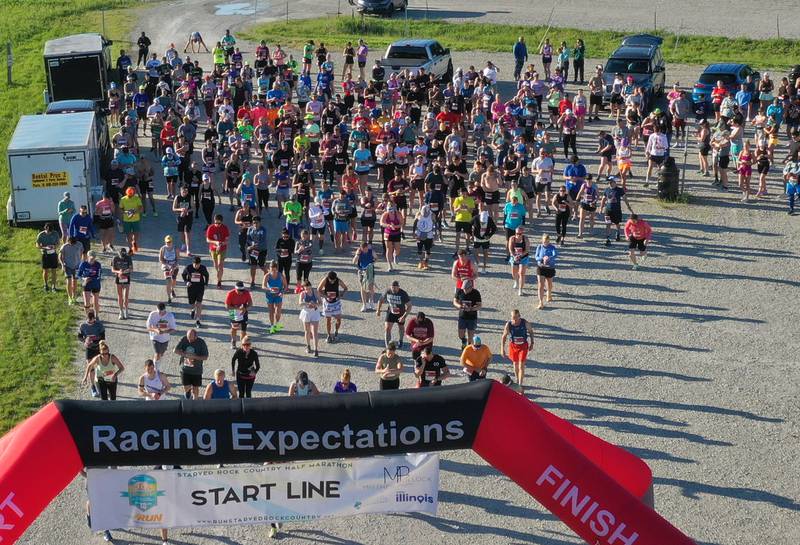 Runners begin the half marathon during the Starved Rock Marathon and Half Marathon on Saturday, May 11, 2024 at Starved Rock State Park.