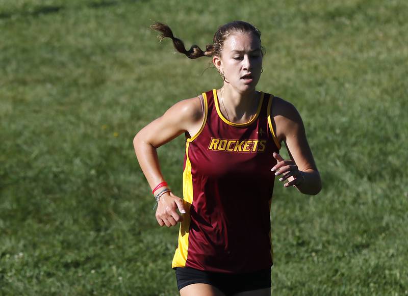 Richmond-Burton’s Alexia Spatz runs to a second place finish in the girls race of the McHenry County Cross Country Invite on Saturday, August 31, 2024, at McHenry Township Park in Johnsburg.