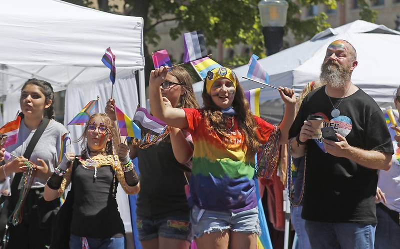 People enjoy the Woodstock PrideFest Parade on Sunday, June 9, 2024, around the historic Woodstock Square.