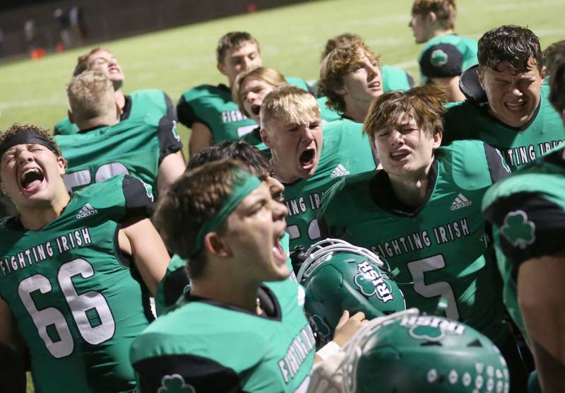 Members of the Seneca football team react after defeating Marquette 21-6 on Friday, Oct. 18, 2024 at Seneca High School.