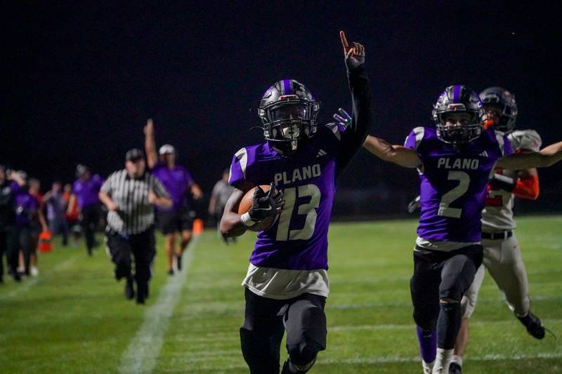 Plano's Amari Bryant (13) returns the opening kick-off of the game back from a touchdown against Sandwich during a football game at Plano High School on Friday, Sep 13, 2024.