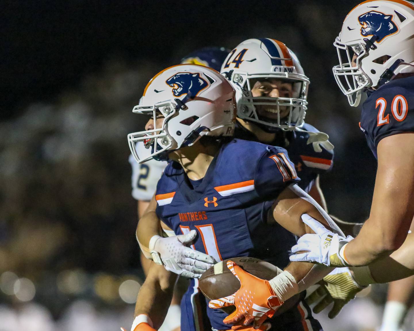 Oswego's Teddy Manikas (11) celebrates with teammates after scoring a touchdown during a football game between Neuqua Valley and Oswego on Friday, Aug. 30, 2024 in Oswego. Gary E Duncan Sr for Shaw Local News Network.