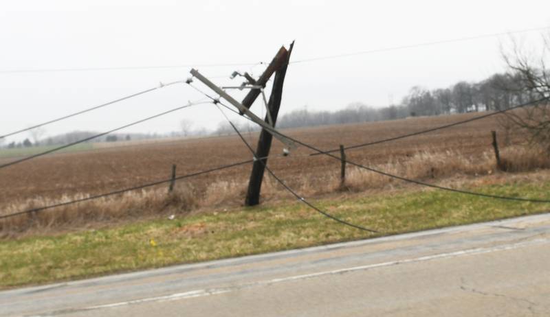 ComEd crews were busy working on the west side of Illinois 2 after Tuesday's hail storm broke off electrical poles knocking electricity out to Grand Detour.