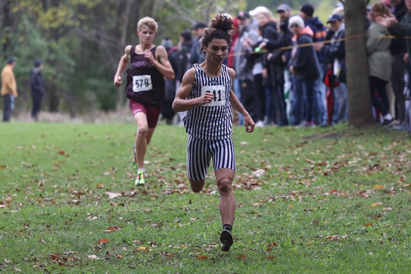 Plainfield South’s Camyn Viger finish second ahead of Plainfield North’s Thomas Czerwinski in the Southwest Prairie Conference meet at Channahon Park in Channahon on Friday, Oct. 13, 2023.