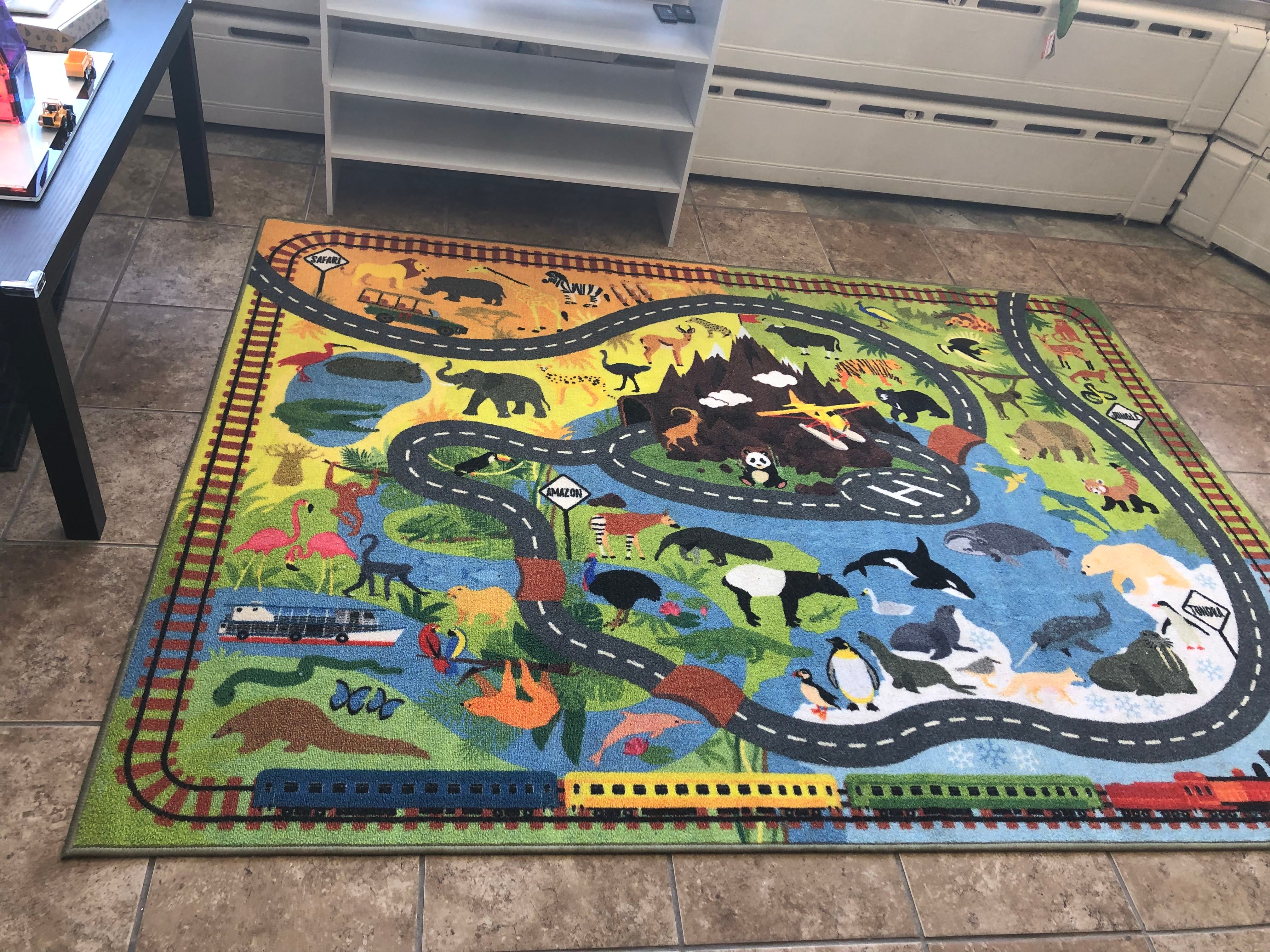 A rug where people can play with toy cars at Revelry Toys in Woodstock Aug. 17, 2024.