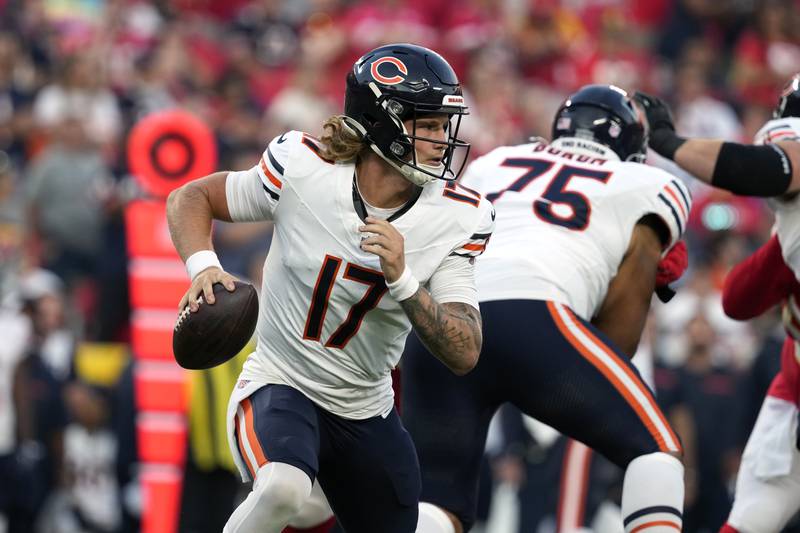 Chicago Bears quarterback Tyson Bagent rolls out during the first half of an NFL preseason football game against the Kansas City Chiefs Thursday, Aug. 22, 2024, in Kansas City, Mo. (AP Photo/Ed Zurga)