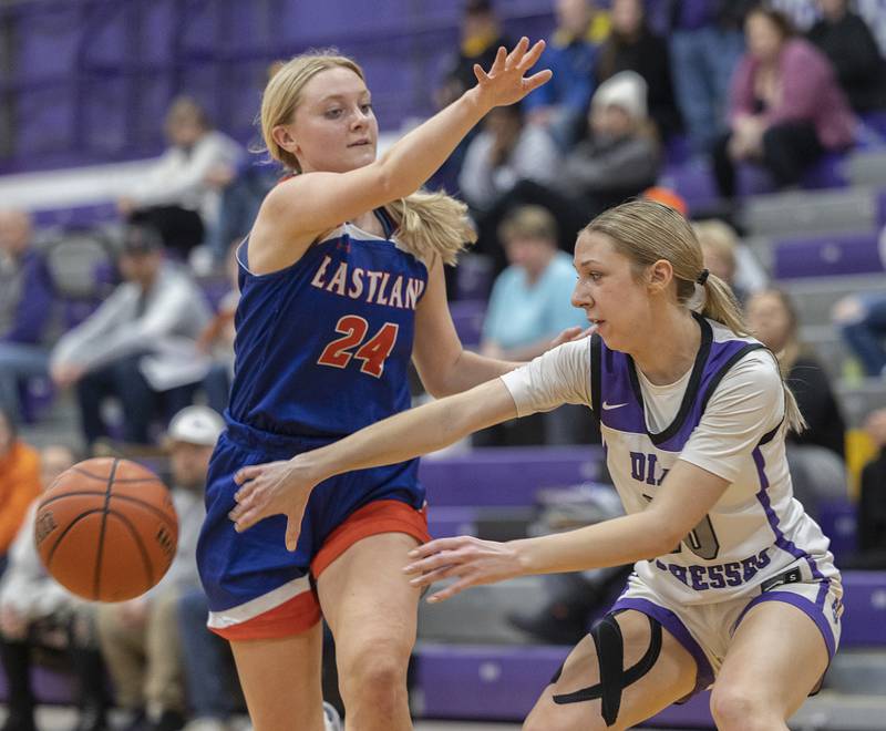 Dixon’s Addy Lohse makes a pass against Eastland’s Lily Mullen Wednesday, Jan. 24, 2024 at Dixon High School.