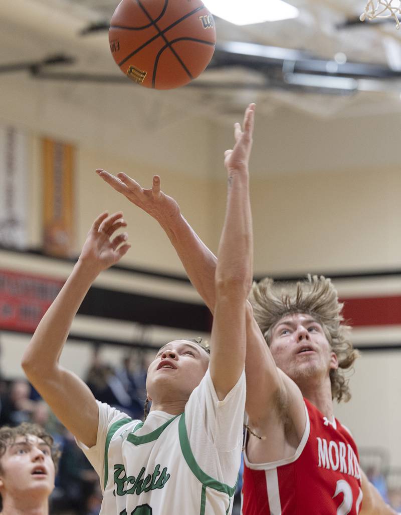 Rock Falls’ Nehemiah Menendez and Morrison’s Brenden Martin go up for a rebound Wednesday, Feb. 21, 2024 at the Prophestown class 2A basketball regional.