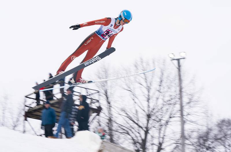 Casey Flett, competing in the Under 20 category with the Itasca Ski Jumping Club from Coleraine, Minnesota, flies through the air during the 117th annual Norge Winter Ski Jump Tournament on Sunday, Jan. 30, 2022 in Fox River Grove.