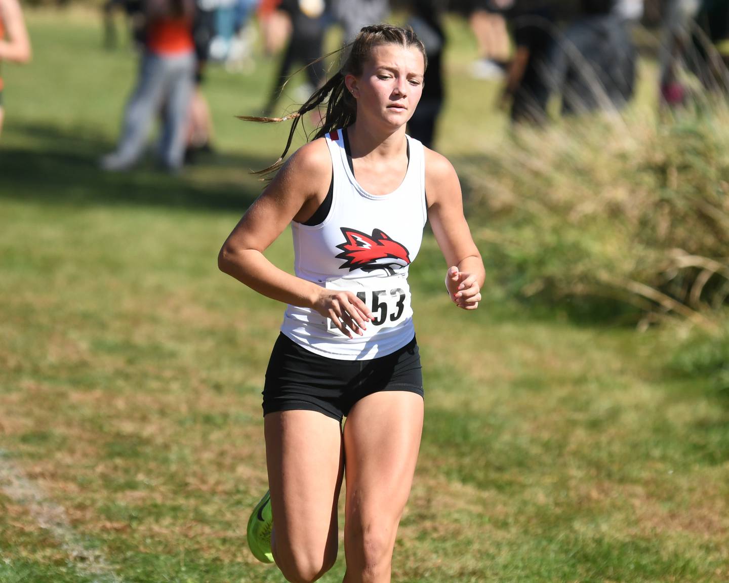 Yorkville’s Ashley Schraeder runs during the conference meet on Friday Oct. 18, 2024, held at Channahon Community Park in Channahon where she took third place with a time of 18:04.10.