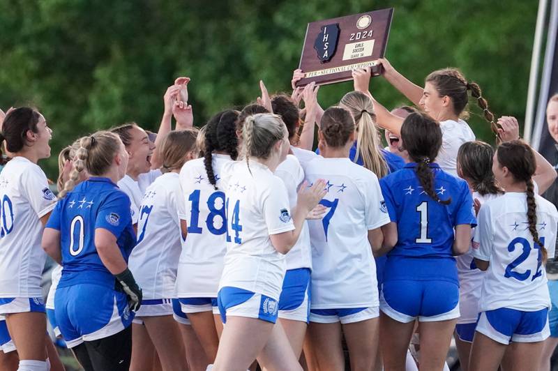 St. Charles North players celebrate their victory over Naperville Central to win the Class 3A St. Charles North Supersectional soccer final at St. Charles North High School on Tuesday, May 28, 2024.