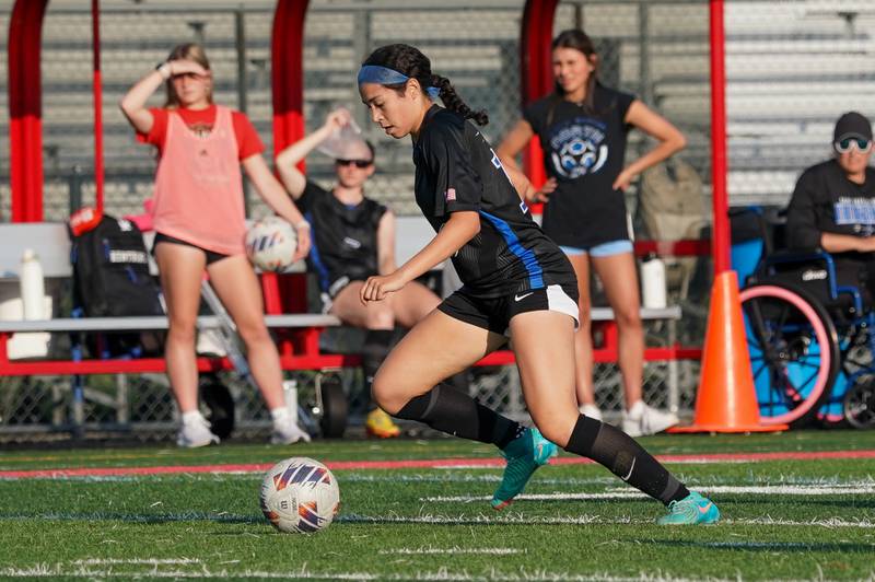 St. Charles North's Juliana Park (18) plays the ball against Batavia during a Class 3A Batavia Regional final soccer match at Batavia High School in Batavia on Friday, May 17, 2024.