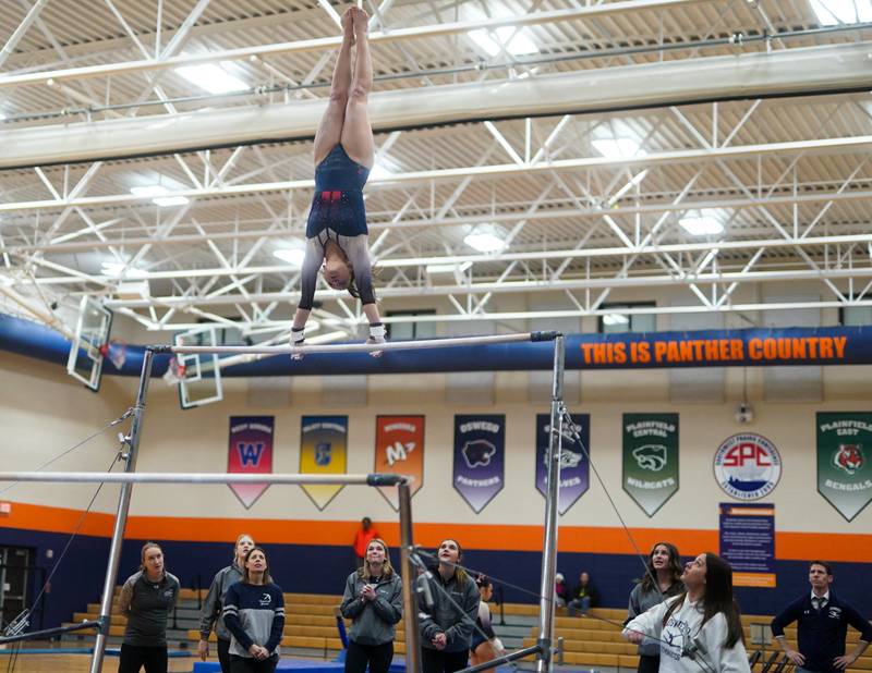 Oswego Co-op's Francesca Schulte competes in the uneven bars during a Oswego Regional Gymnastics Meet at Oswego High School on Monday, Jan 29, 2024.