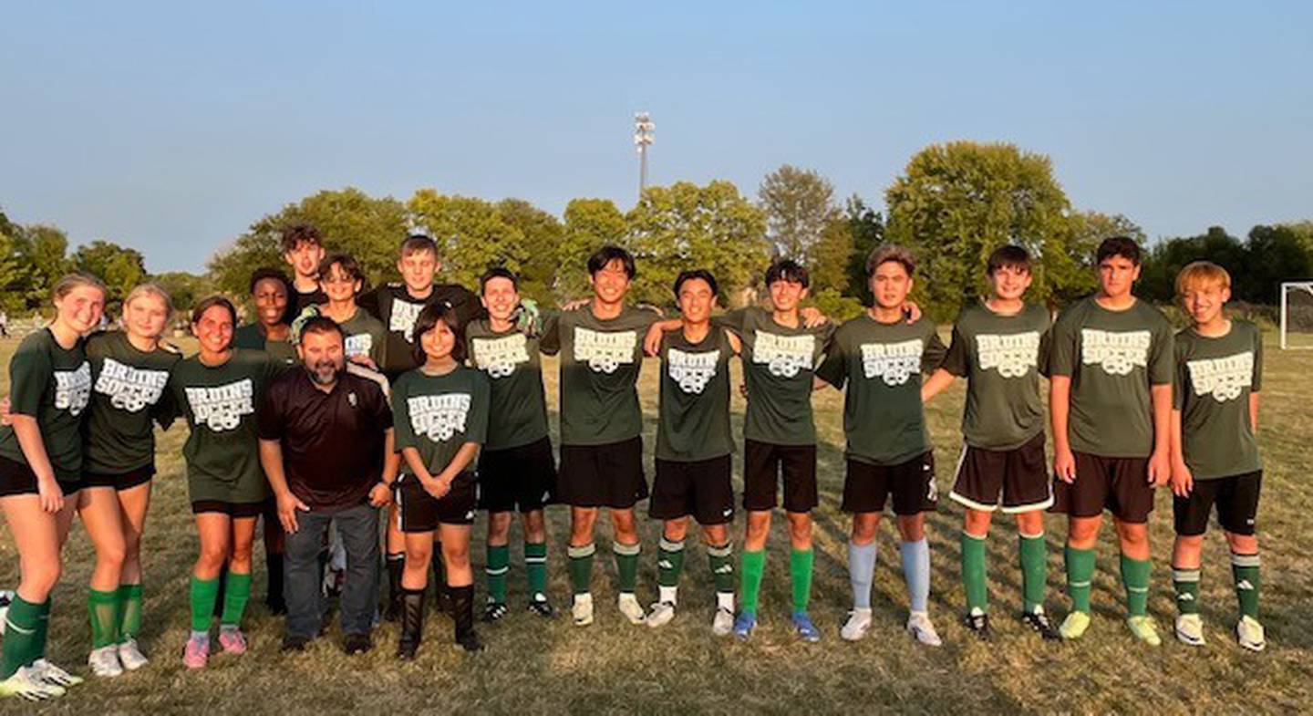 Members of the St. Bede soccer team pose for a photo after the Bruins' first game against Somonauk at Rotary Park in La Salle.