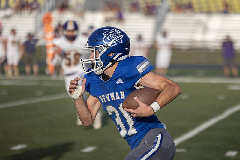 Newman’s Cody McBride runs back an interception against Sherrard Saturday, Sept. 2, 2023 in a game at Sterling High School.