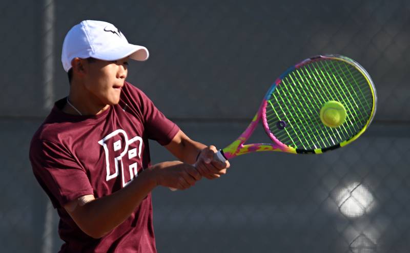 Jacob Kim of Prairie Ridge returns the ball during the Class 1A consolation semifinals during the boys state tennis tournament at Palatine High School on Saturday, May 25, 2024 in Palatine.