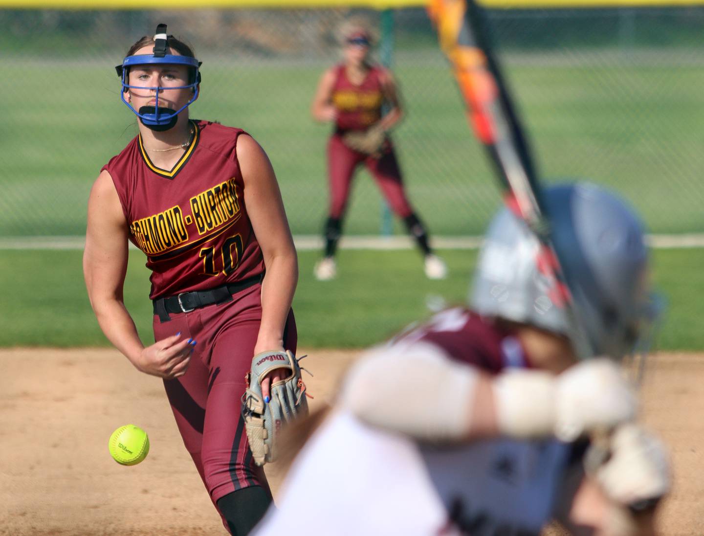 Richmond-Burton’s Hailey Holtz delivers in varsity softball at Marengo Monday.