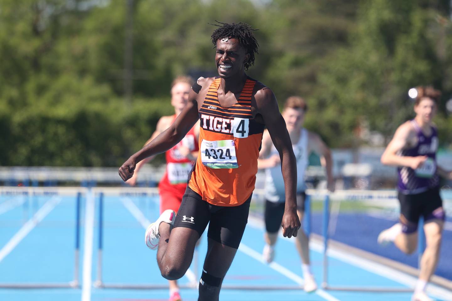 Wheaton Warrenville’s Amari Williams wins the Class 3A 300 Meter Hurdles State Championship on Saturday, May 25, 2024 in Charleston.