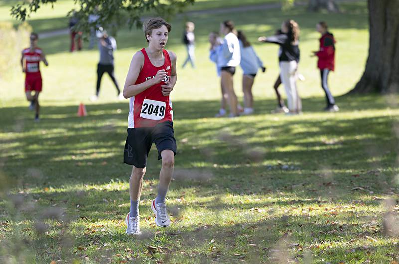 Amboy’s Jhett Cowser runs through the course Monday, Oct. 9, 2023 during the 50th Amboy Columbus Day Cross Country Invite.