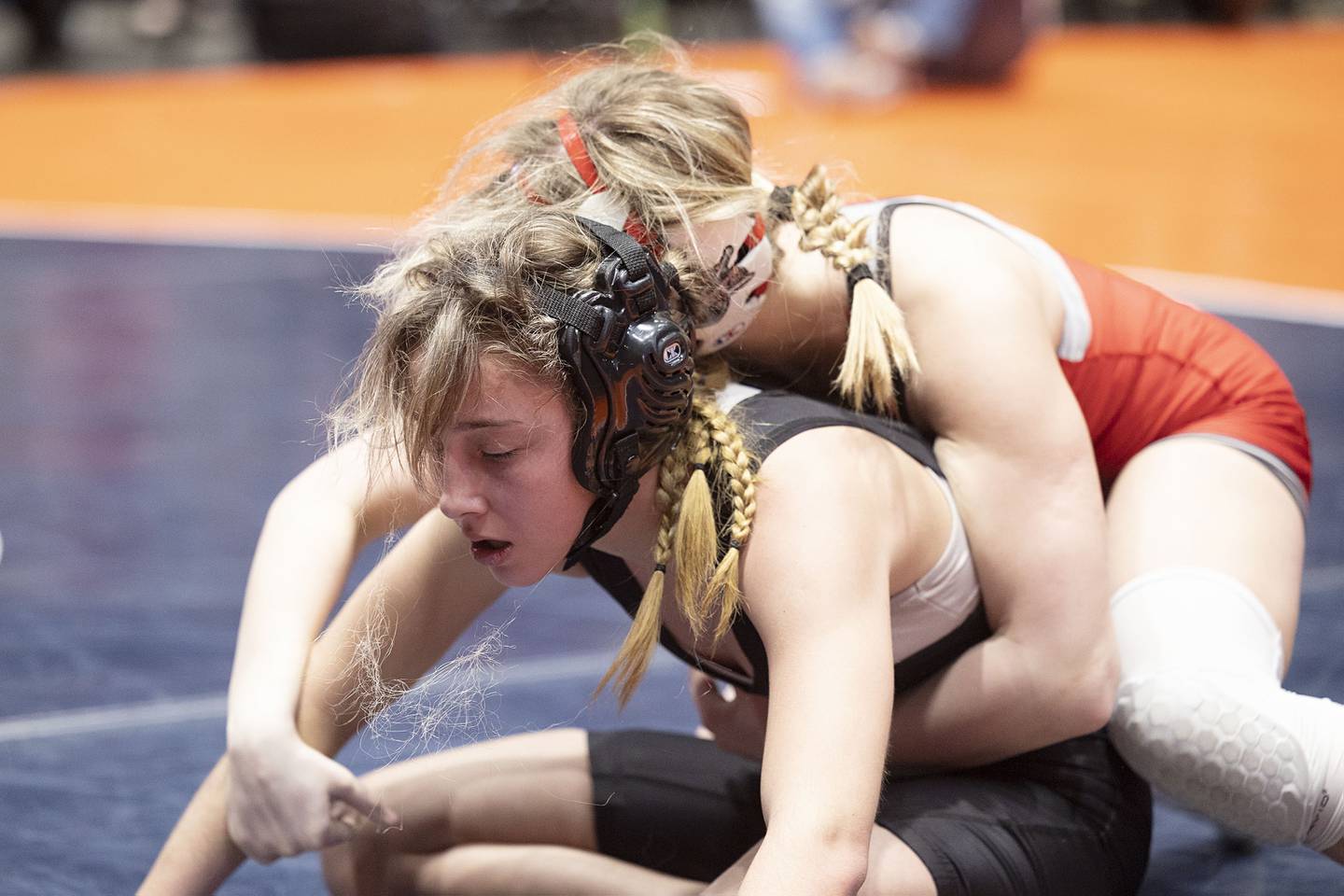 Ayane Jasinski of Fox Lake Grant (bottom) and Gracie Guarino of Lincolnway Central wrestle in the 110 pound championship match at the IHSA girls state wrestling championships Saturday, Feb. 25, 2023.