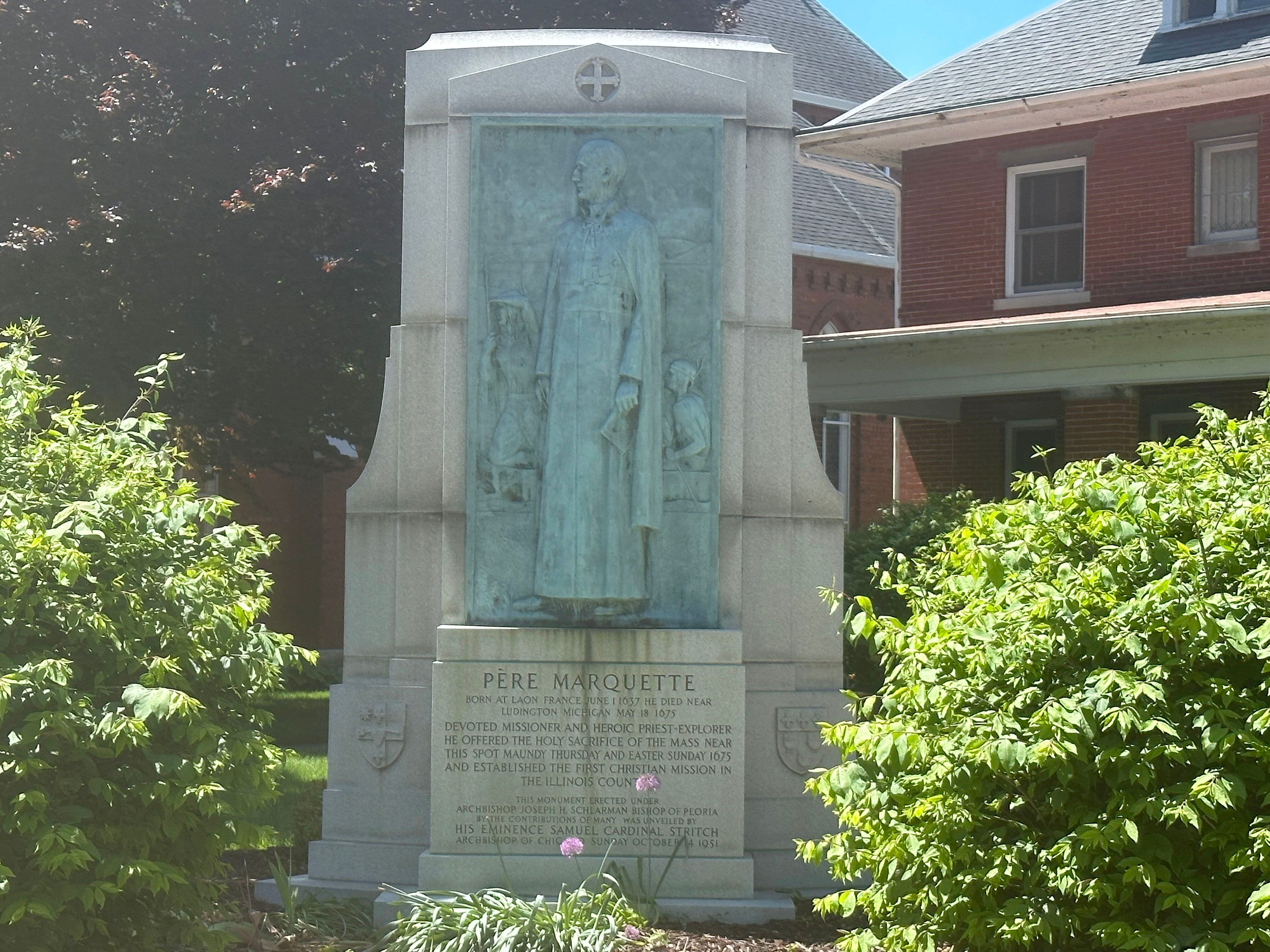 A statue of Father Pere Marquette stands Tuesday, May 16, 2023, outside of St. Mary's Church in Utica. Two years after Marquette's voyage with Louis Jolliet, on Holy Thursday, April 11, 1675, Francis Jacques Marquette offered the first parochial Mass in the Illinois Country at Utica in the presence of 5,000 Native Americans.