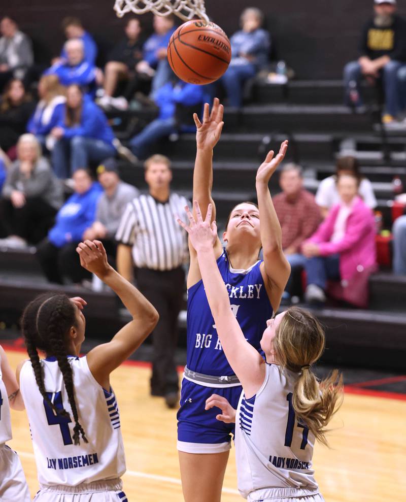 Hinckley-Big Rock's Raven Wagner shoots over Newark’s Addison Long Thursday, Jan. 18, 2024, during the Little 10 girls basketball tournament at Indian Creek High School in Shabbona.