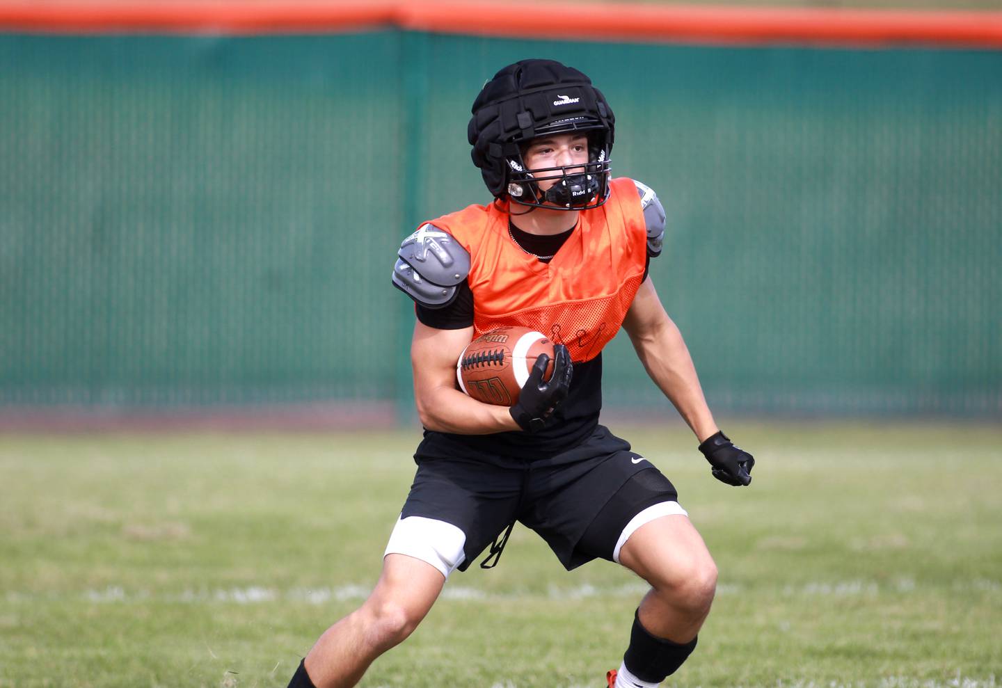 St. Charles East wide receiver Sheko Gjokaj runs the ball in from a kick-off during a practice on Thursday, Aug. 22, 2024 in St. Charles.