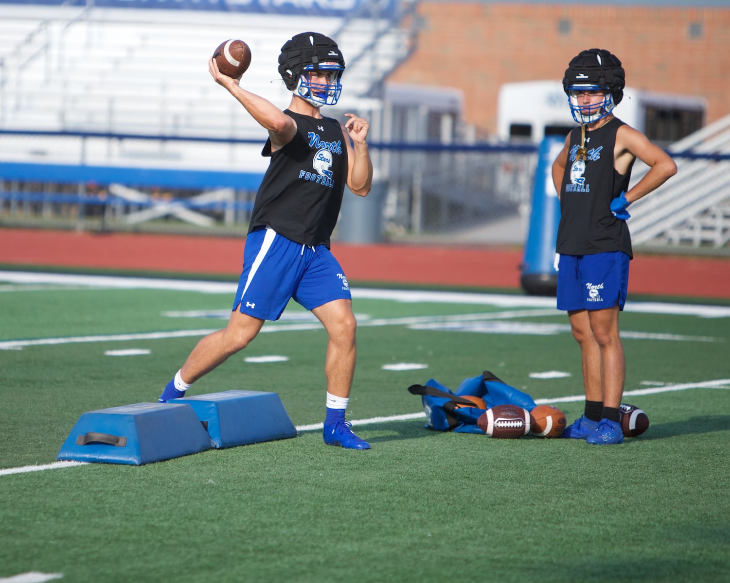 St. Charles North's Ethan Plumb practices throws during the first day of practice on Monday Aug.12,2024 in St. Charles.