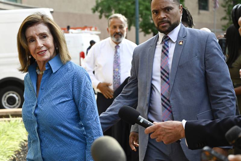 Rep. Nancy Pelosi, D-Calif., the speaker emerita, left, arrives at the Democratic National Headquarters with other Democratic members of the House of Representatives to discuss the future of President Biden running for the presidency, Tuesday, July 9, 2024 in Washington. (AP Photo/John McDonnell)