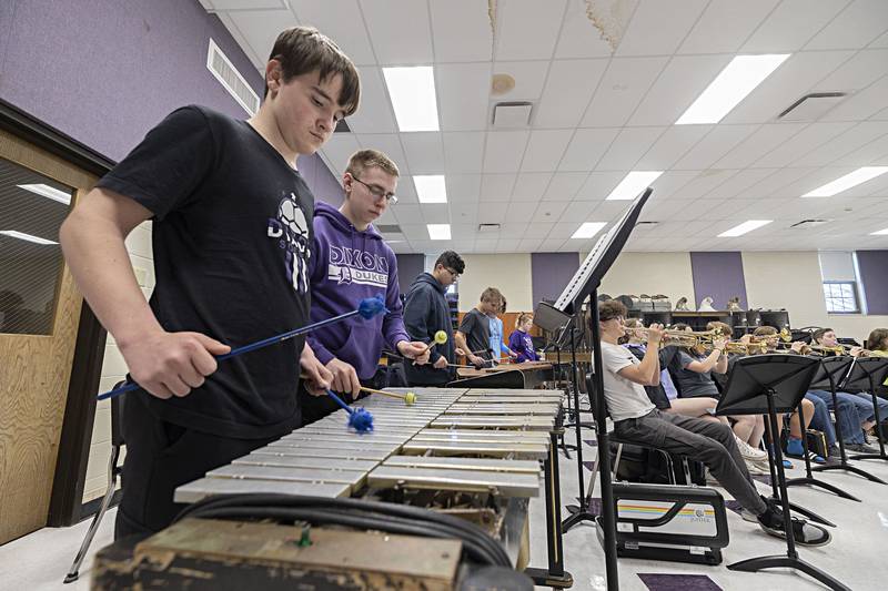 Dixon High School band students practice for upcoming contests Tuesday, April 11, 2023.