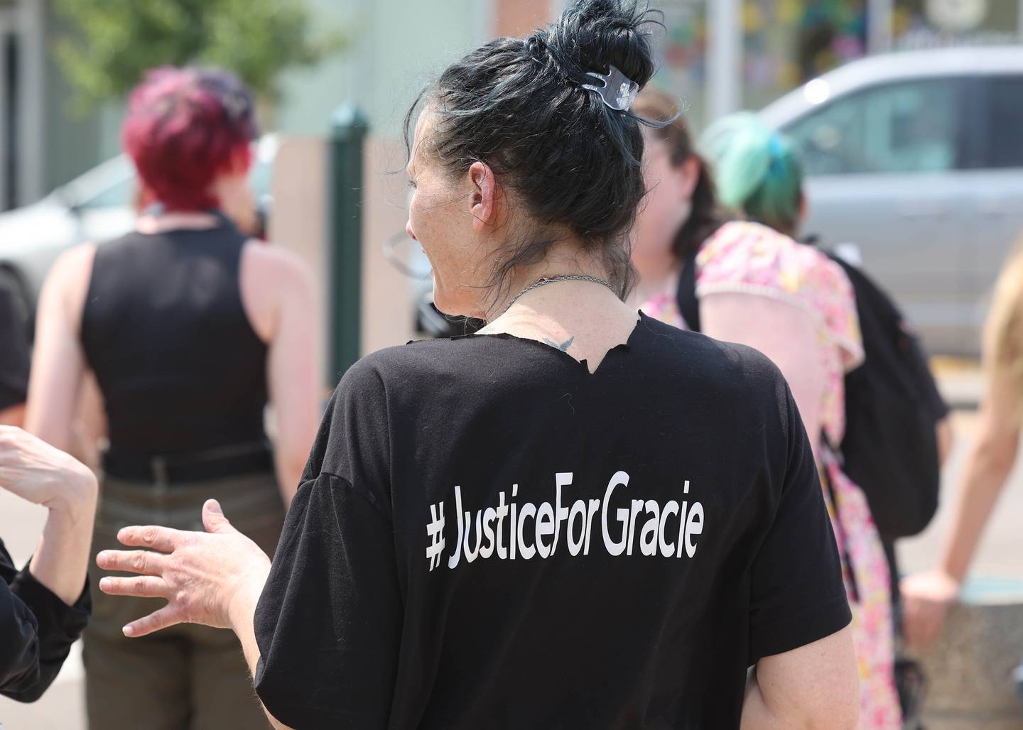 Ericka Sasso, of DeKalb, mother of slain teen Gracie Sasso-Cleveland, drops by a protest Wednesday, June 14, 2023, in front of the DeKalb County Courthouse in Sycamore. The protesters are asking for harsher sentences for those convicted of domestic or sexual abuse. They began shortly after the arraignment hearing of Timothy M. Doll, a registered sex offender charged with murder in DeKalb teen’s death.