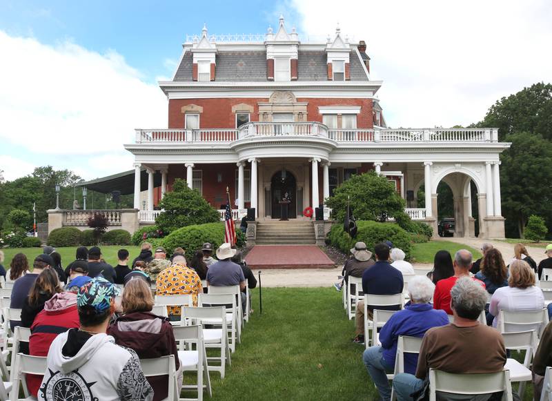 Attendees listen to speakers Monday, May 27, 2024, during the DeKalb Memorial Day program at Ellwood House.