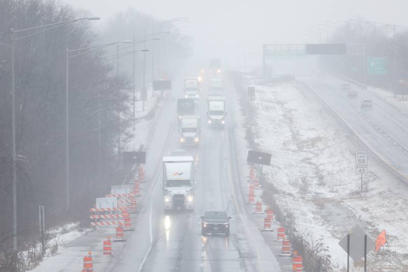 Traffic moves along eastbound I-80 as morning snow turned to afternoon mix of rain and snow on Tuesday, Jan. 9th, 2024 in Joliet.