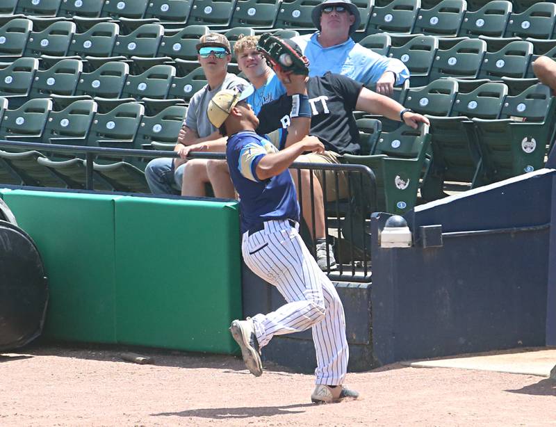 Marquette's Sam Mitre makes the final out of the game against Routt during the Class 1A semifinal game on Friday, May 31, 2024 at Dozer Park in Peoria.