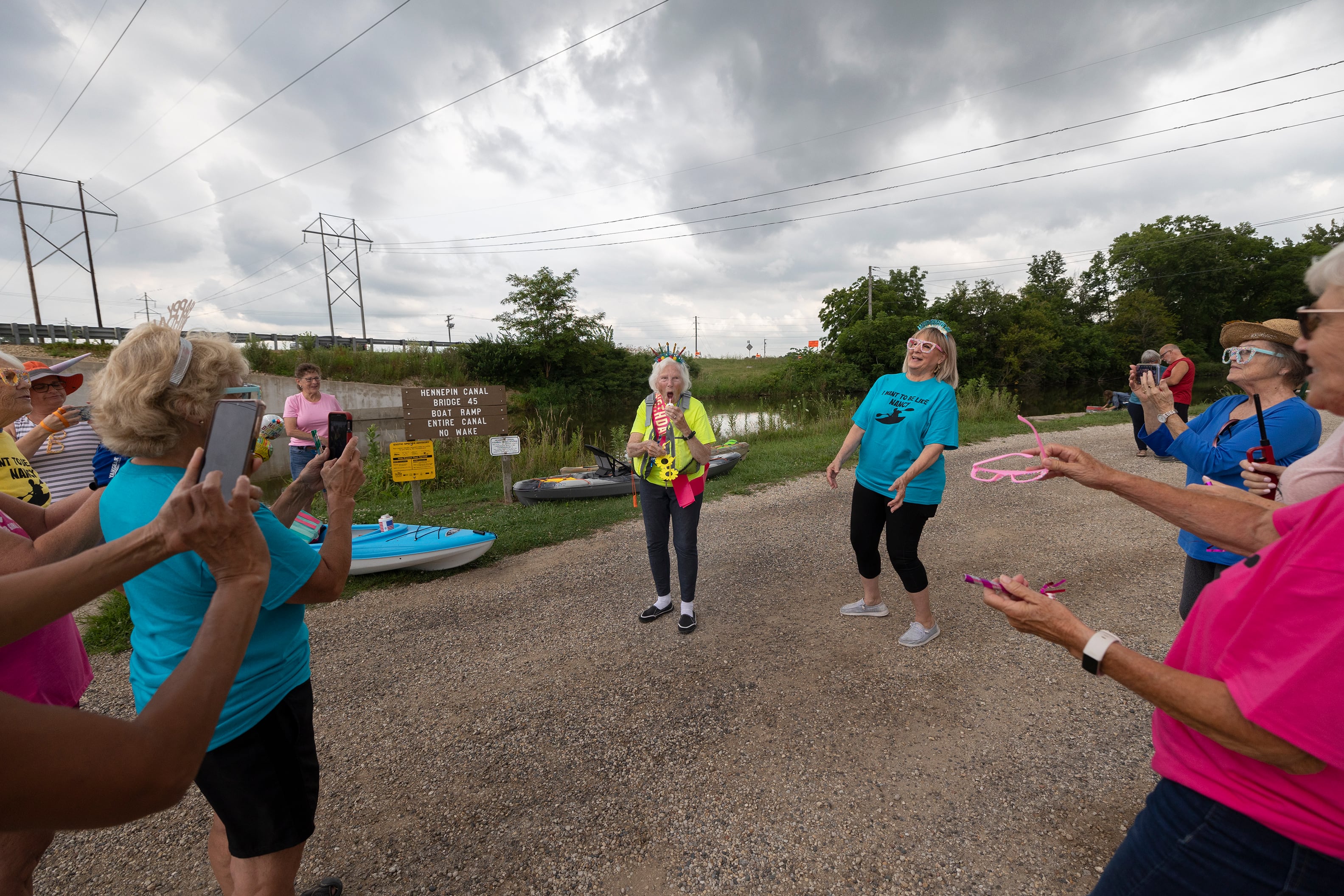 A rousing rendition of Happy Birthday is sung to Nancy Gates Wednesday, July 24, 2024 by the members of the Yak-Yak Sisters kayaking group.