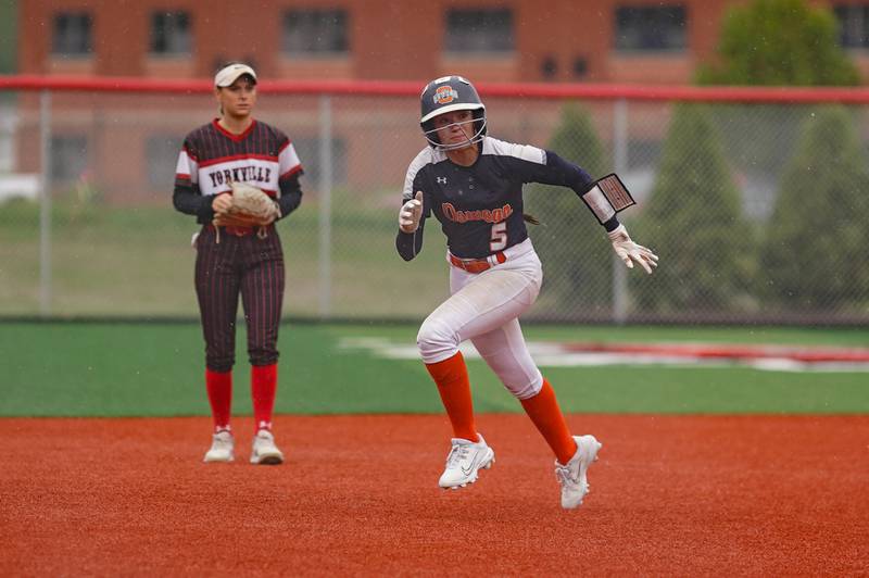 Oswego’s Marissa Moffett (5) rounds second during a softball game against Yorkville at Yorkville High School on Thursday, May 9, 2024.