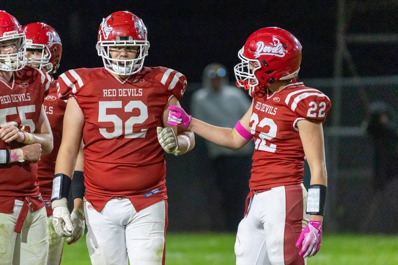 Jack Jablonski and Cameron Spalding of Hall fist bump on Friday, October 18, 2024 at Richard Nesti Stadium in Spring Valley.