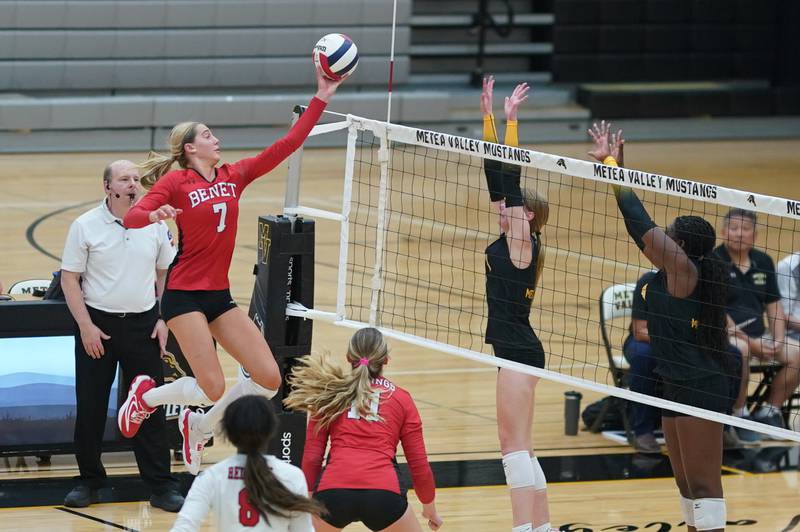 Benet’s Audrey Asleson (7) plays the ball at the net against Metea Valley's Ashley Ward (1) during a volleyball match at Metea Valley High School in Aurora on Wednesday, Sep 4, 2024.