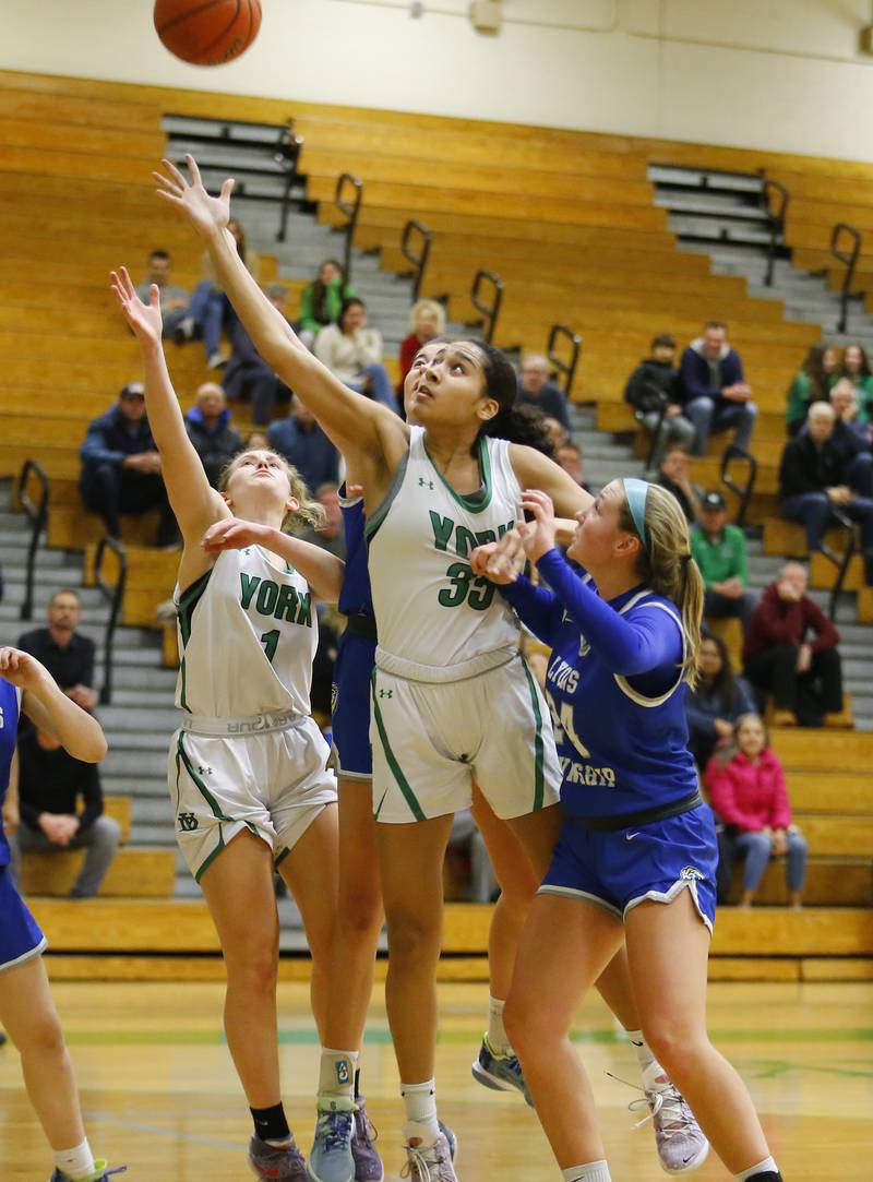 York's Angelina Downer (35) puts up a shot during the girls varsity basketball game between Lyons Township and York high schools on Friday, Dec. 16, 2022 in Elmhurst, IL.