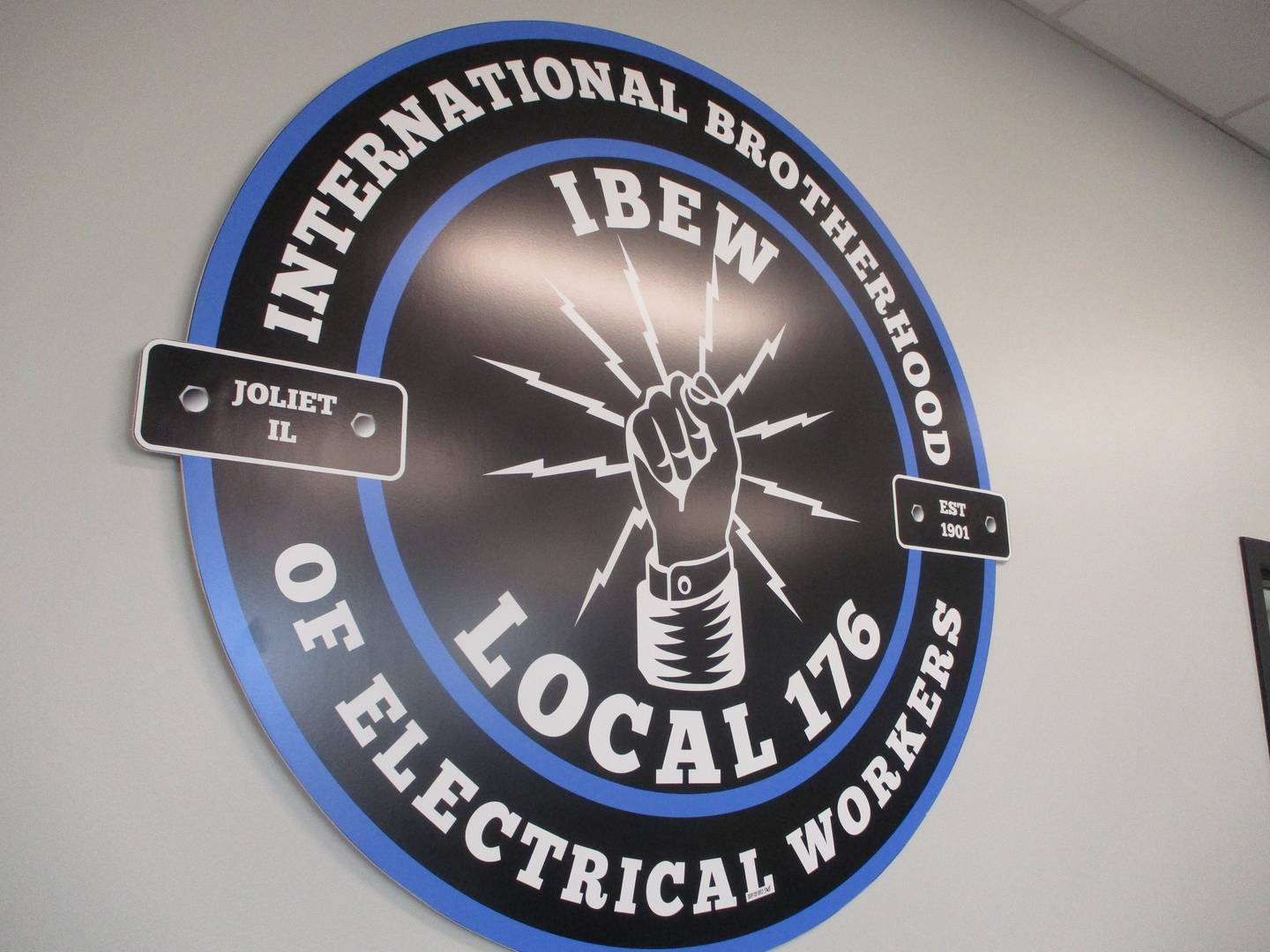 The International Brotherhood of Electrical Workers seal is on display at the new Joliet Electrical Training Center. Sept. 12, 2024