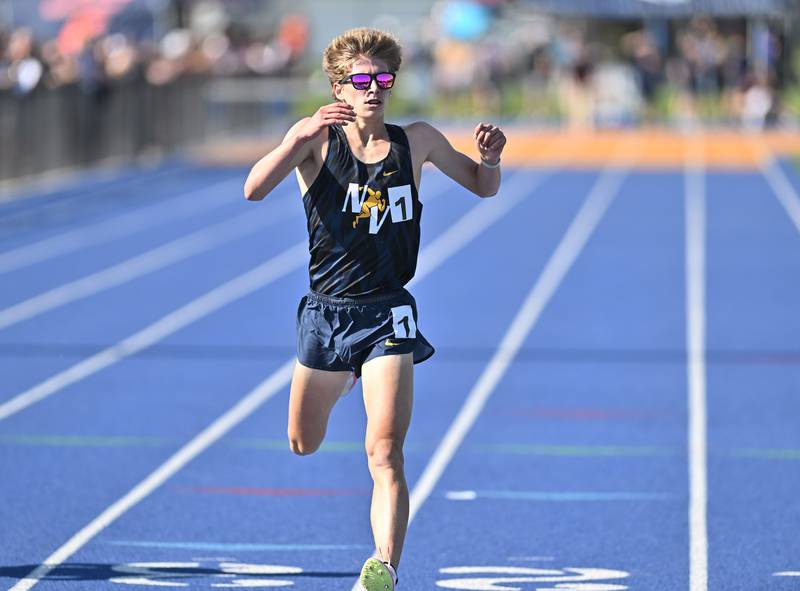 Neuqua Valley's Zac Close crosses the finish line in the 3200 meter event during the IHSA 3A Sectional track meet  on Friday, May. 17, 2024, at Joliet.